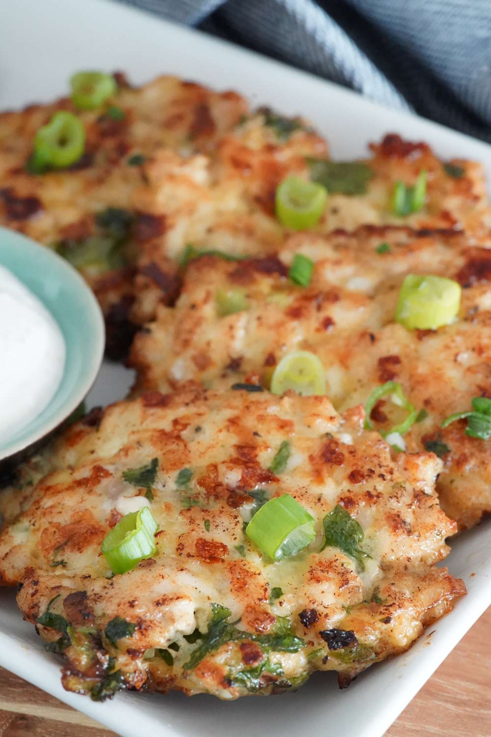 A plate of cheesy chicken fritters