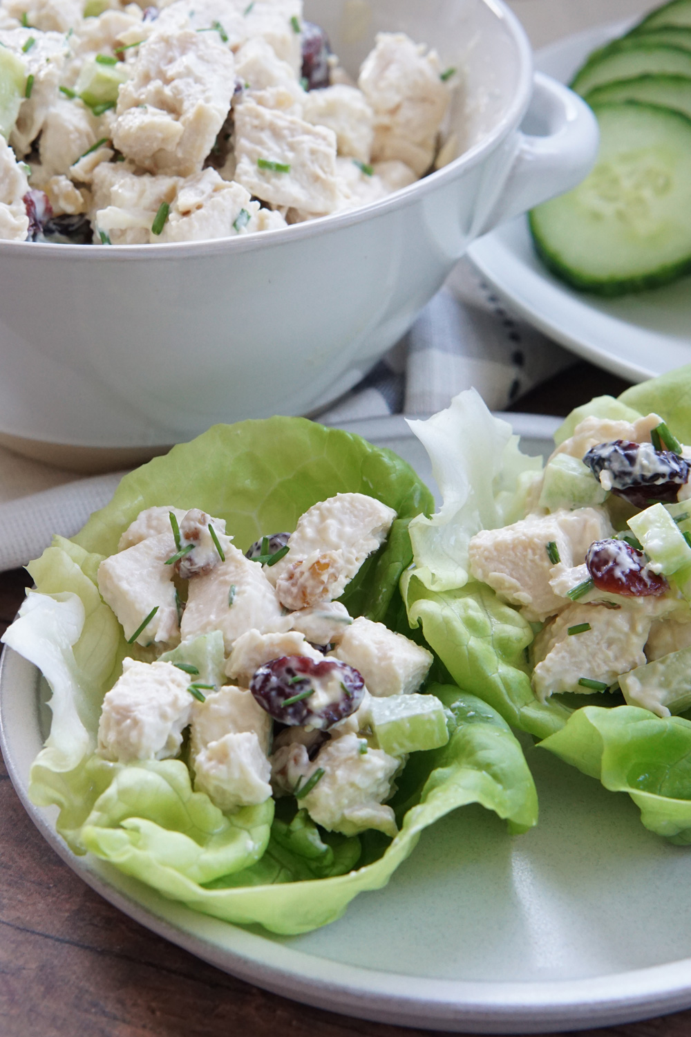 cranberry walnut chicken salad in lettuce leaves