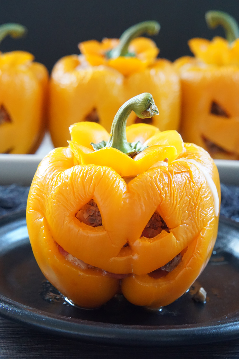 Halloween Jack-o-Lantern stuffed peppers